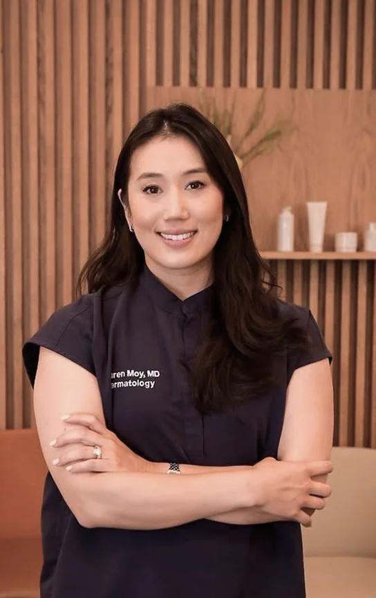 Portrait shot of Dr. Moy in Black Scrubs.